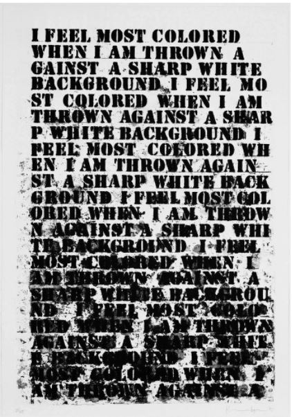 Image of block print writing that says: I feel most colored when I am thrown against a sharp white background. I feel more street when I am thrown against a sharp white background. I feel most colored when I am thrown against a sharp white background. These phrases repeat until their ink is smeared.
